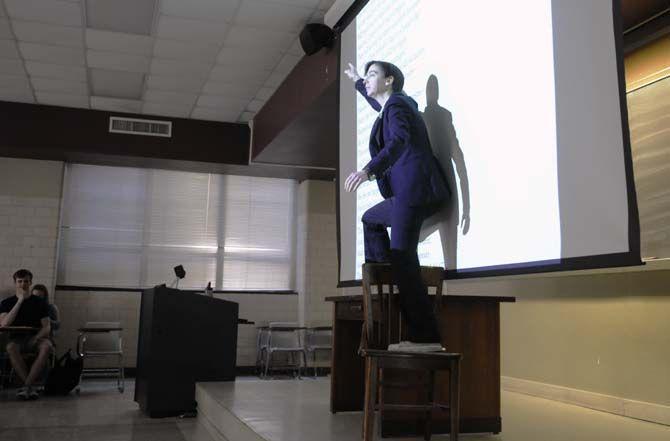 Dr. Barrett talks to the class about Henry the V. She had all the students stand up and participate in the reading on Wednesday, September 17, 2014