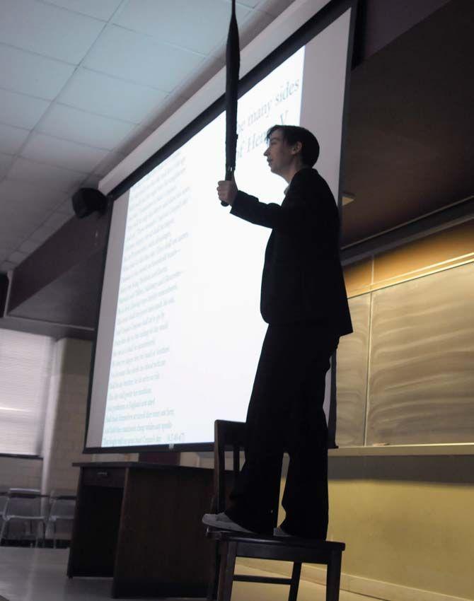 Dr. Barrett talks to the class about Henry the V. She had all the students stand up and participate in the reading on Wednesday, September 17, 2014