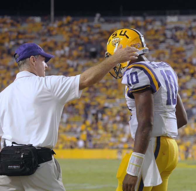 LSU sophmore quarterback Anthony Jennings (10) gets a quick pep talk during the game against Mississippi State Saturday September 20, 2014 where LSU lost 34-29 in Tiger Stadium.