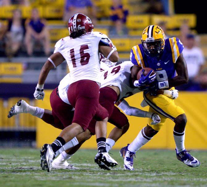LSU freshman wide receiver John Diarse runs the ball down the field Saturday, September 27, 2014 during the Tigers' 63-7 victory against the Aggies in Tiger Stadium.
