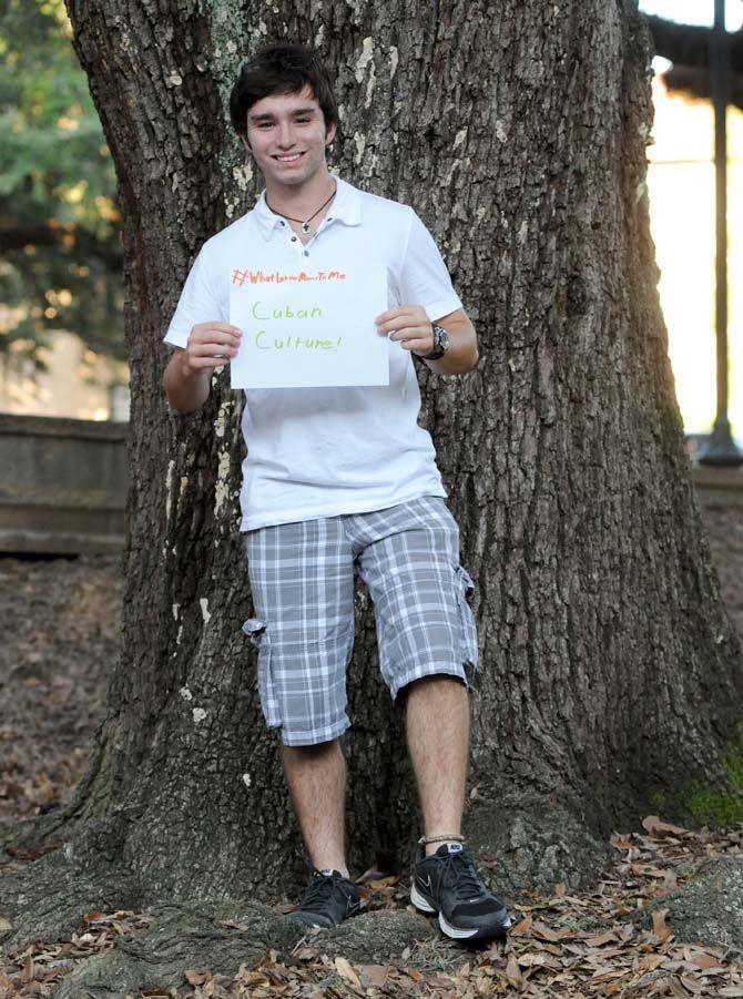 The Hispanic Student Cultural Society make signs about what being Latino means to them.