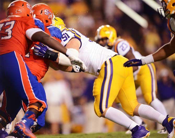 LSU sophomore defensive tackle Christian LaCouture (91) blocks Sam Houston State's offensive line Saturday, September 6, 2014 during the Tigers' 56-0 win against the Bearkats in Tiger Stadium.