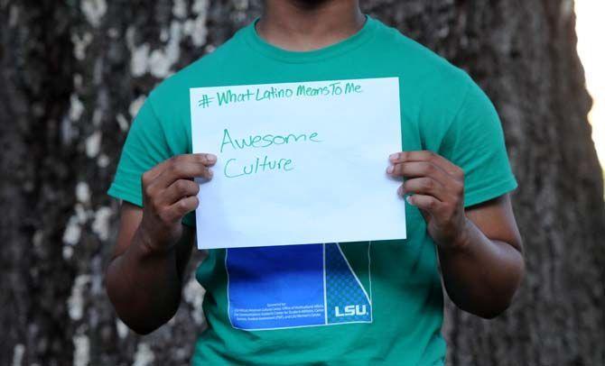 The Hispanic Student Cultural Society make signs about what being Latino means to them.