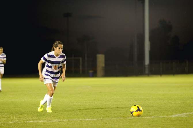 LSU junior midfielder Natalia Gomez-Junco (11) gets ready to throw a free kick during the Tigers' victory 3-0 against Nicholls Tuesday, September 2, 2014 in LSU Soccer Stadium.