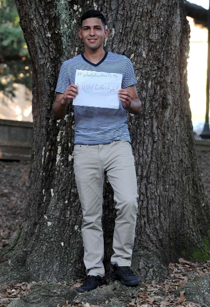 The Hispanic Student Cultural Society make signs about what being Latino means to them.