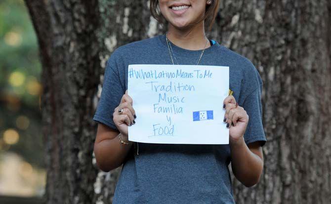 The Hispanic Student Cultural Society make signs about what being Latino means to them.