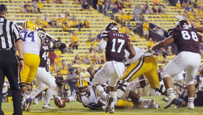 LSU freshman quarterback Brandon Harris (6) tries to score a touchdown during the Mississippi State game Saturday September 20, 2014 where LSU lost 34-29 in Tiger Stadium.