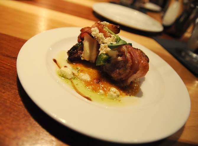 C'est Si Bon's downtown Baton Rouge food tour included a stop at Restaurant IPO for bacon wrapped duck on Friday August 29, 2014.