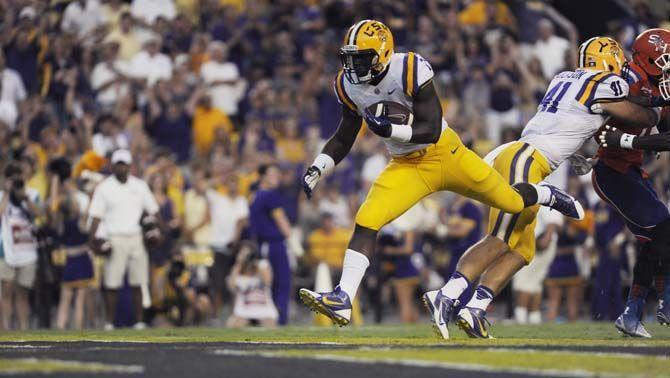 LSU freshman running back Leonard Fournette (7) scores a touchdown Saturday, September 6, 2014 during the Tigers' 56-0 win against Sam Houston State in Tiger Stadium.
