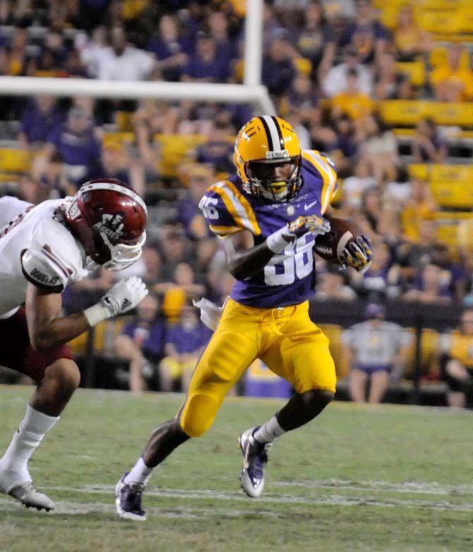 LSU freshman wide receiver Miquel James (86) runs the ball down the field in Tiger Stadium Saturday, September 27, 2014.