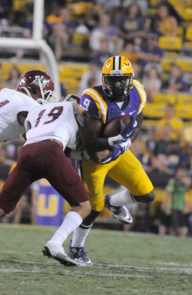 LSU freshman wide receiver John Diarse (9) runs the ball down the field in Tiger Stadium Saturday, September 27, 2014. Tigers win 63-7 against NMSU Aggies.