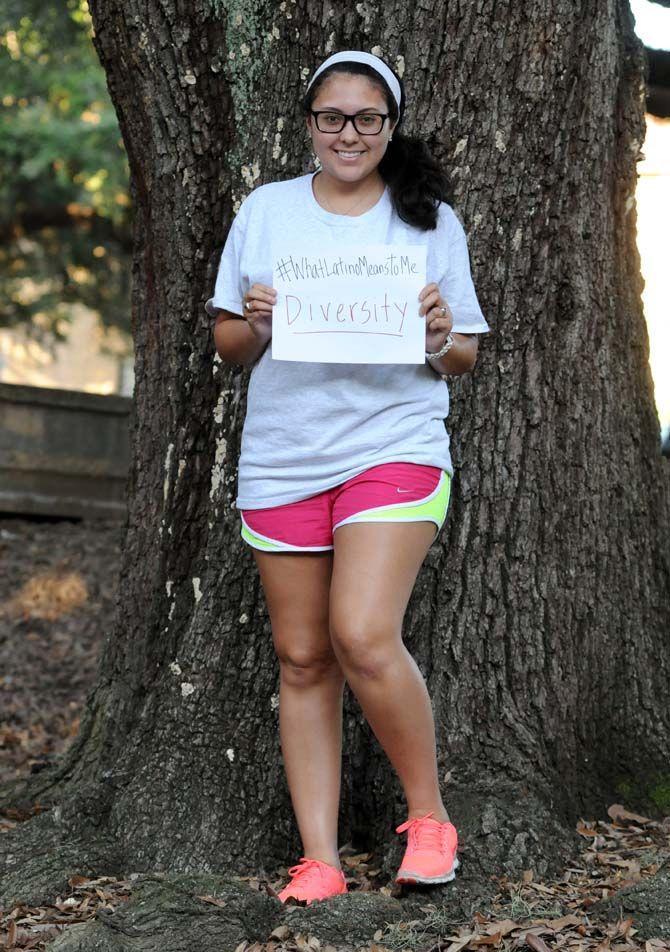 The Hispanic Student Cultural Society make signs about what being Latino means to them.