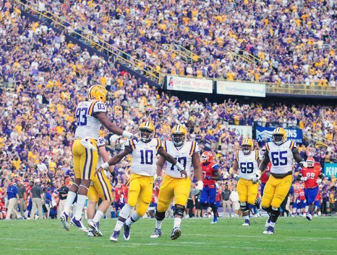 LSU sophomore wide receiver Travin Dural (83) celebrates a touchdown with his teammates Saturday, September 6, 2014 during the Tigers' 56-0 win against Sam Houston State in Tiger Stadium.