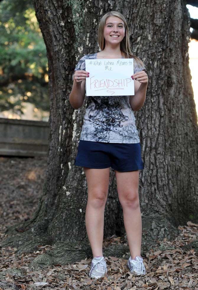 The Hispanic Student Cultural Society make signs about what being Latino means to them.