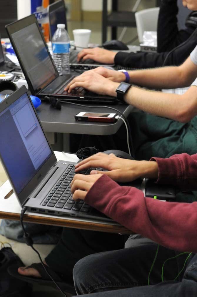 Students work at LSU's Hackathon Saturday, August 30, 2014.