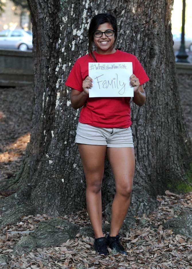 The Hispanic Student Cultural Society make signs about what being Latino means to them.