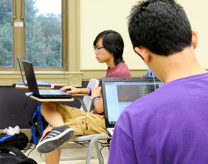 Students work at LSU's Hackathon Saturday, August 30, 2014.