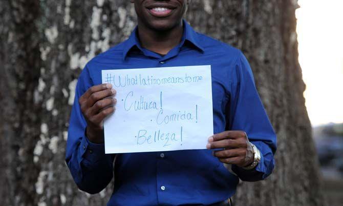 The Hispanic Student Cultural Society make signs about what being Latino means to them.