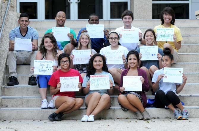 The Hispanic Student Cultural Society make signs about what being Latino means to them.