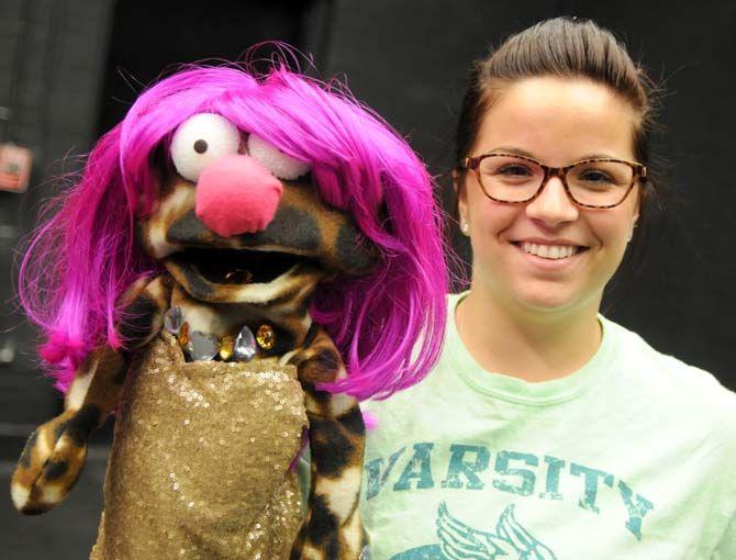 Communication studies senior Marissa Voros poses with puppet "Valerie" that she made in Communication Studies 3900 in Black Box Theatre.