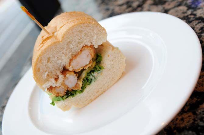 C'est Si Bon's downtown Baton Rouge food tour included a stop at Capital City Cafe with dressed, shrimp po-boys on Friday August 29, 2014.