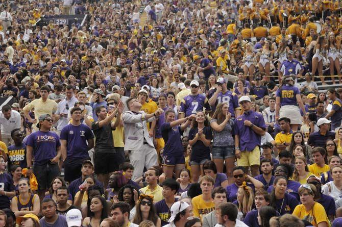 Students dance while they support LSU football team before the game Saturday, September 6, 2014 inside Tiger Stadium.