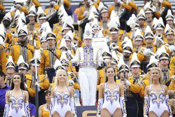 The LSU Tiger Band and Golden Girls pose in their uniforms Saturday, September 6, 2014 during the Tigers' 56-0 win against Sam Houston State in Tiger Stadium.