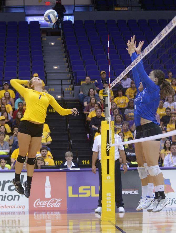 LSU volleyball junior Outside Hitter Katie Lindelow (7) jumps to spike the ball during the loss aginst Kentucky Wednesday, September 24, 2014 in the PMAC.