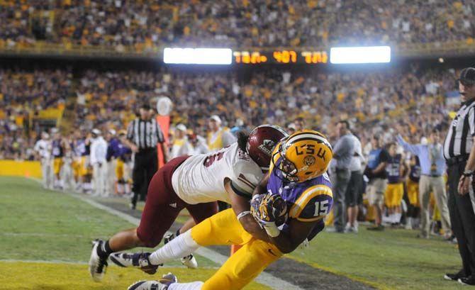 LSU freshman wide receiver Malachi Dupre (15) scores a touchdown in a winning game 63-7 against NMSU in Tiger Stadium Saturday, September 27, 2014.