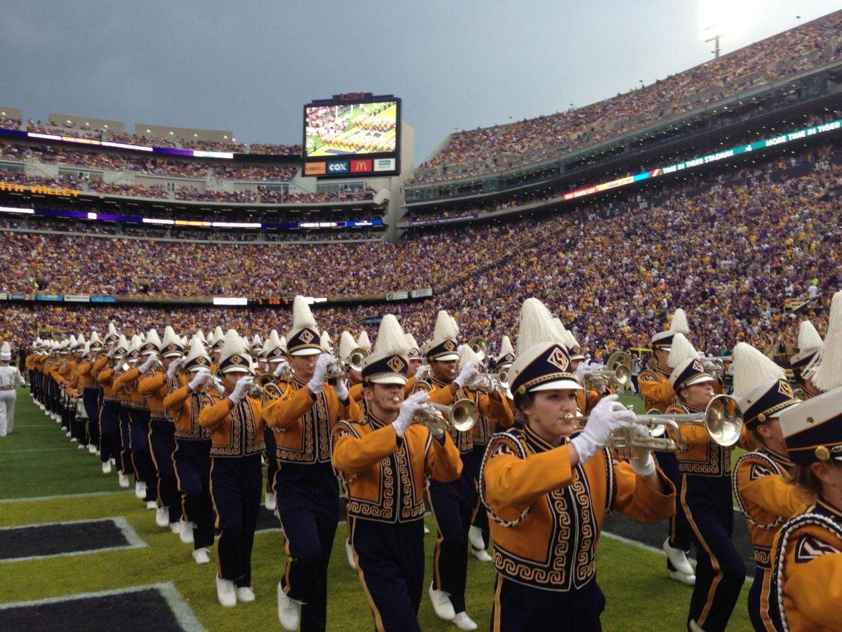 The Golden Band from Tigerland performs on the field before the game.&#160;