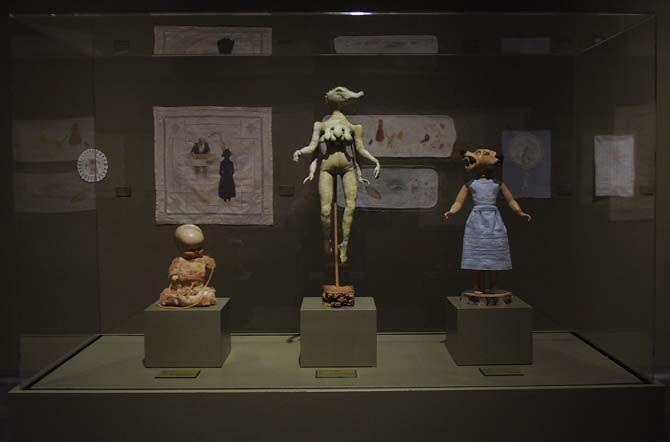 Figurines on display at the LSU Museum of Art for the 'Accalia and the Swamp Monster: Works by Kelli Scott Kelley' exhibit.