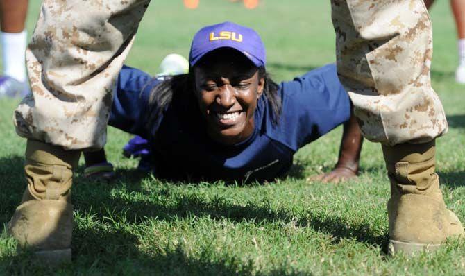 LSU women's basketball sophmore guard Raigyne Moncrief performes drills under special instruction during practice with the marines on Friday September 19, 2014.