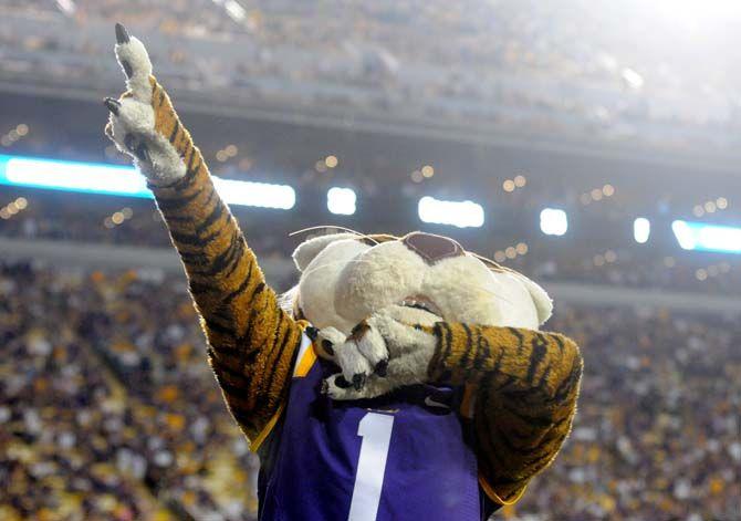 Mike celebrates a touchdown for the Tigers in winning game 63-7 against NMSU Aggies.