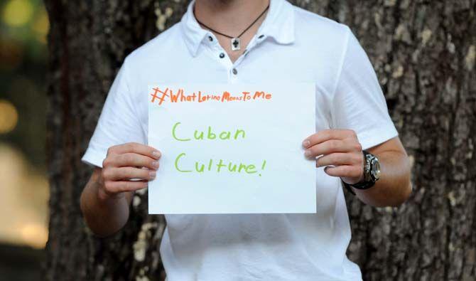 The Hispanic Student Cultural Society make signs about what being Latino means to them.