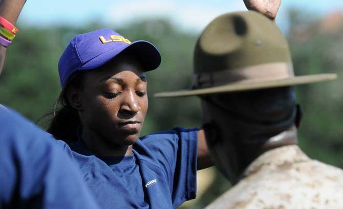 LSU women's basketball sophmore guard Raigyne Moncrief performes drills under special instruction during practice with the marines on Friday September 19, 2014.