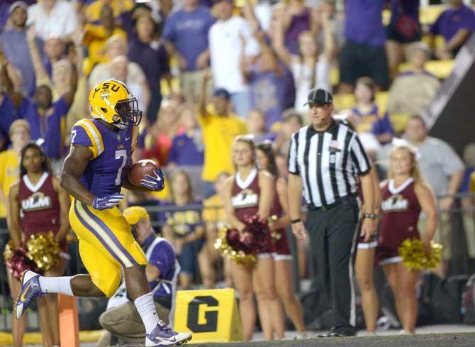 Freshman running back Leonard Fournette (7) runs for a touchdown during the Tigers' 31-0 victory against ULM on Saturday, September 14th, 2014.