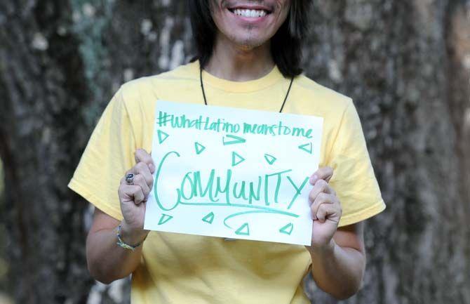 The Hispanic Student Cultural Society make signs about what being Latino means to them.