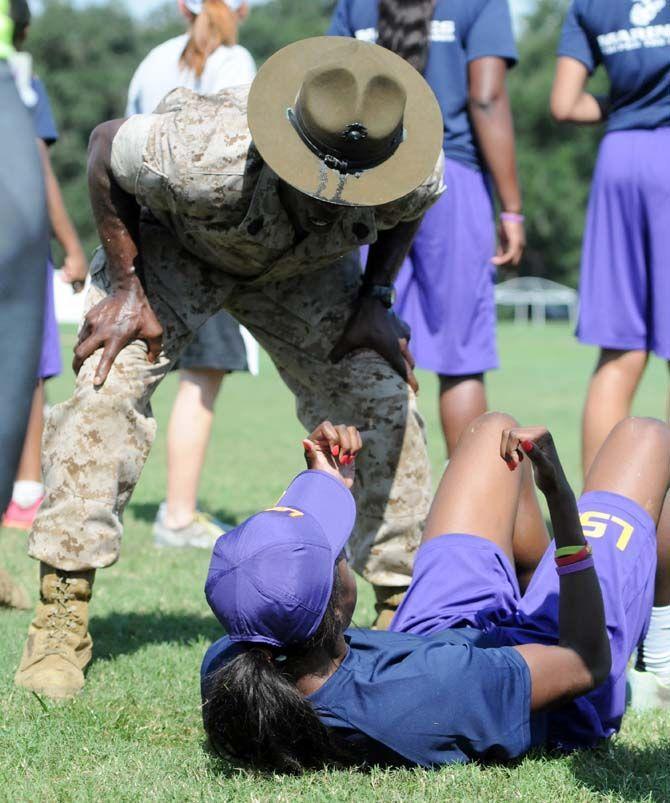 LSU women's basketball sophmore guard Raigyne Moncrief performes drills under special instruction during practice with the marines on Friday September 19, 2014.