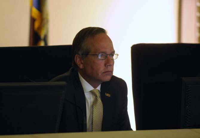 King Alexander listens to Steven Goldsmith give the board a report looking on how to make parking more efficient to the board of supervisors, Friday, September 12, 2014 in the administration building.