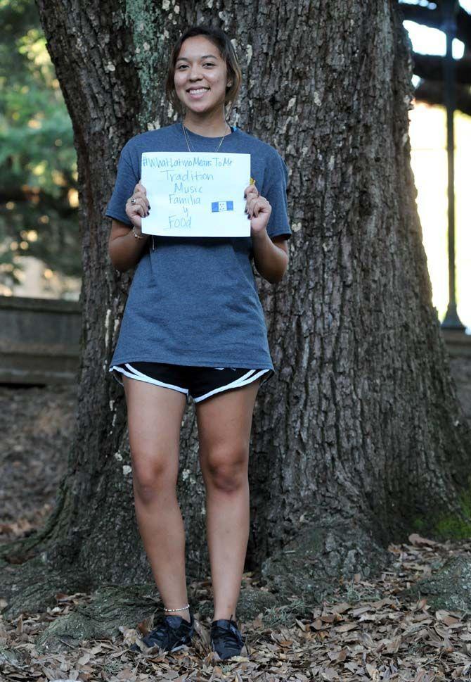 The Hispanic Student Cultural Society make signs about what being Latino means to them.