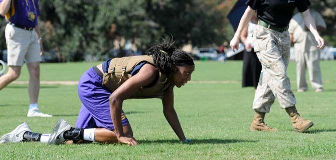 LSU women's bsaketball senior forward Sheila Boykin crawls for a drill during practice with the marines on Friday September 19, 2014.