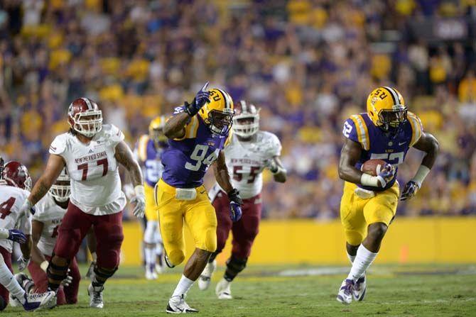 LSU sophomore linebacker Kendell Beckwith (52) leads the ball down the field for a touchdown against New Mexico State in Tiger Stadium on Saturday, September 27, 2014. Tigers won 63-7 against Aggies.