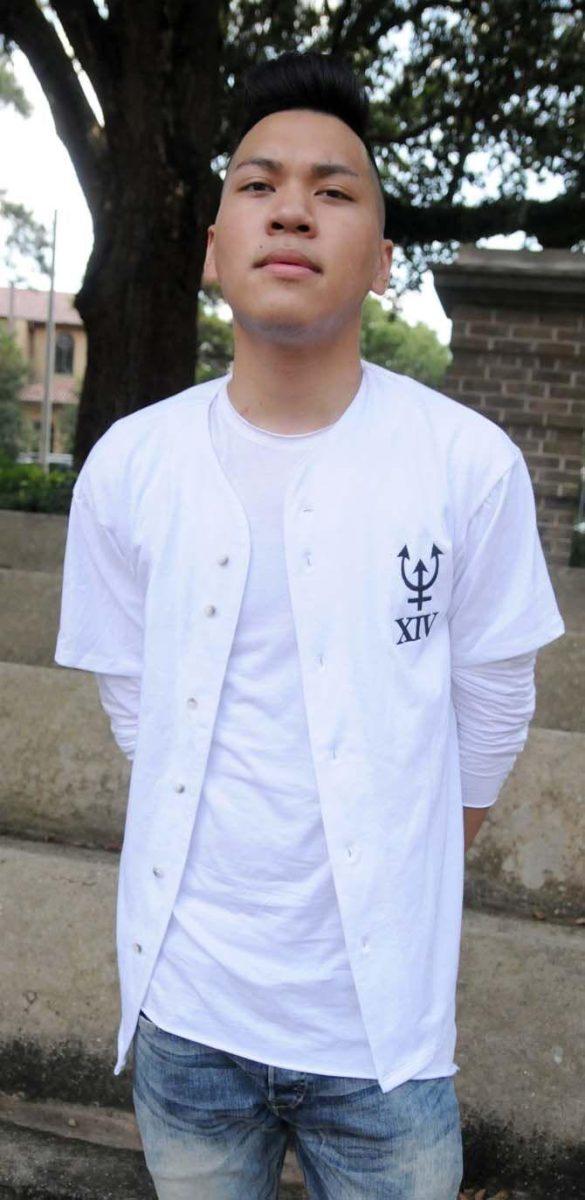 LSU student Josh Tran models student designer Kevin Nguyen's new Berreti clothing.