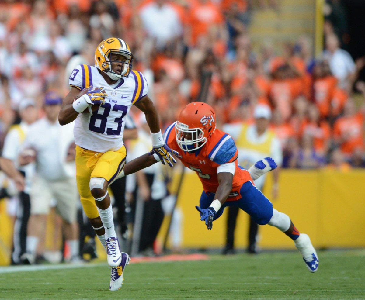 LSU's Travin Dural (#83) passes up Sam Houston's defense and runs to the end zone Saturday night September 6, 2014.