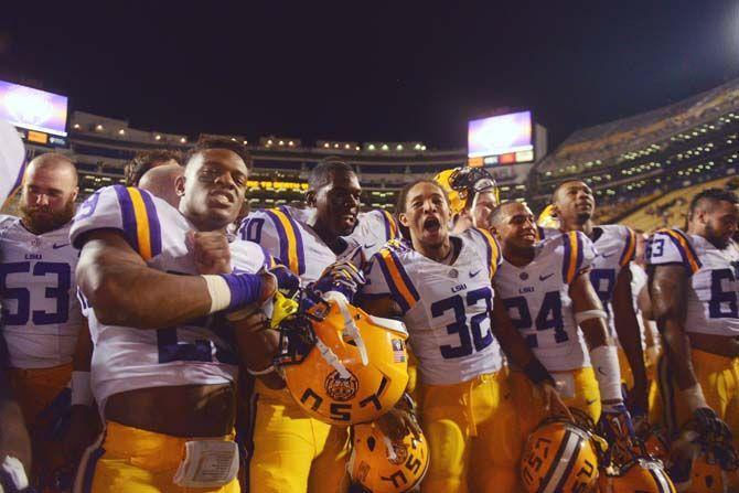 Members of the LSU football team gather and celebrate Saturday, September 6, 2014 after the Tigers' 56-0 win against Sam Houston State in Tiger Stadium.