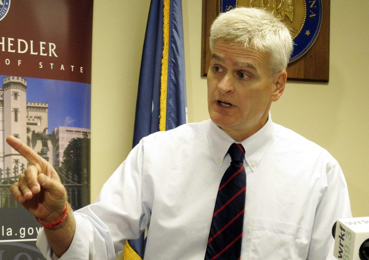 FILE - In this Aug, 20, 2014 file photo, U.S. Rep. Bill Cassidy, a Republican, speaks to reporters after qualifying to run for the U.S. Senate in Baton Rouge, La. A handful of tight races in states with quirky election laws make for the headache-inducing possibility that Election Day will come and go without a deciding which party controls the U.S. Senate. And if that happens, brace for a fierce runoff election and possible recounts that could make for an ugly holiday season in politics and government. (AP Photo/Melinda Deslatte)