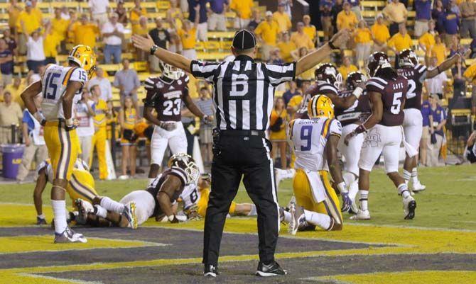 The referee calls the last play of the evening as Tigers lose 34-29 to Mississippi St. in Tiger Stadium Saturday September 20, 2014.