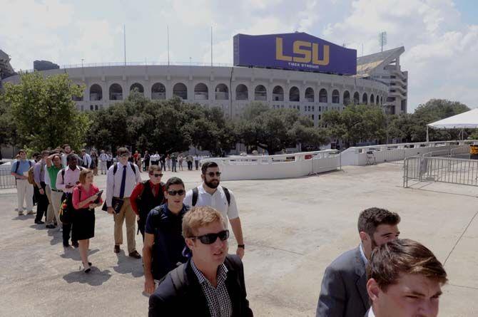 Students stand in line to get inside the PMAC for LSU job fair on Tuesday, September 9, 2014