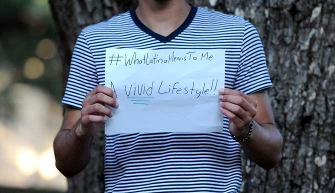 The Hispanic Student Cultural Society make signs about what being Latino means to them.