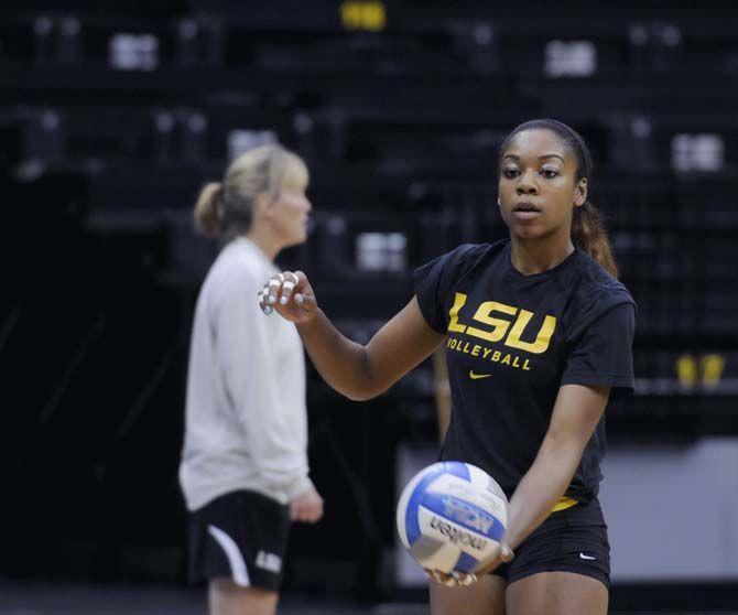 LSU sophomore middle blocker Briana Holman (13) gets ready to hit the ball Monday, August 25, 2014 in the PMAC.